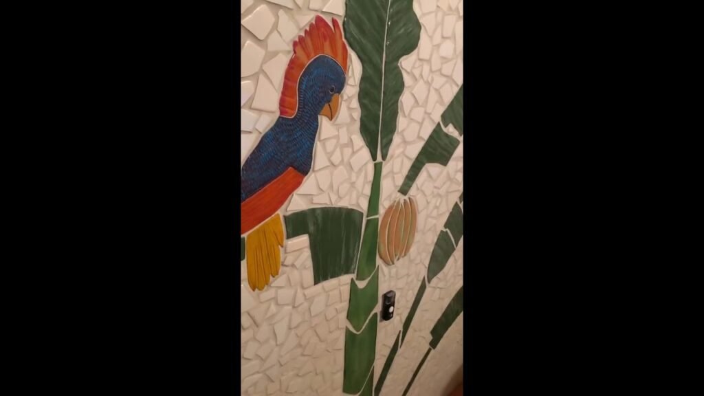 Parrot mosaic. Tile work done in bathroom by southwest artist